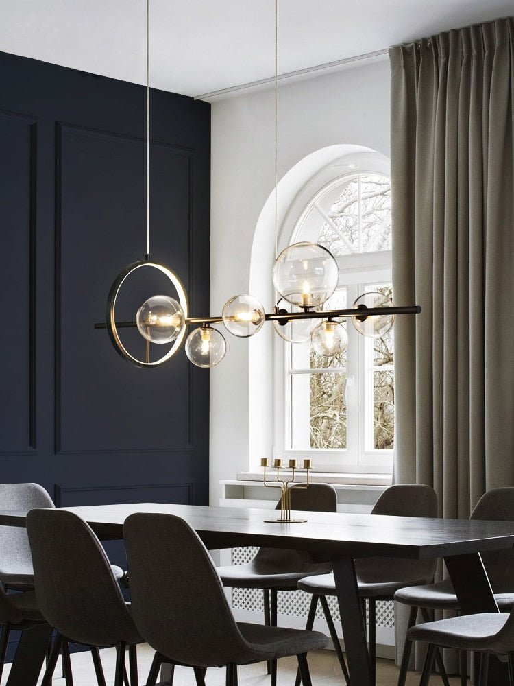 Round flying light bulbs in a luxurious dining room overlooking a huge arched window