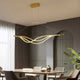 Modern LED Curved Pendant Light above the dining table_ZenQ Designs