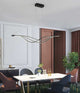Modern LED Curved Pendant Light in a modern dining room
