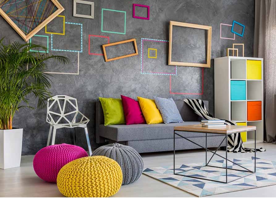 Multicolored empty frames scattered on the grey wall I ZenQ Designs 200489 - Wall decoration as an artistic inspiration