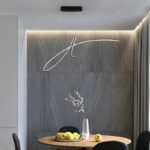 Harmony of the Modern Strip Pendant Light and a round dining table _ZenQ Designs.
