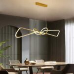 Warm light of the Modern Creative LED Chandelier that illuminates a dining table_ZenQ Designs