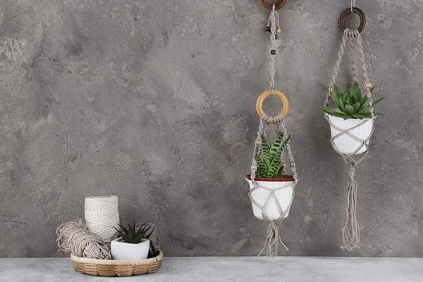 A hanging macrame knitting for flower pots