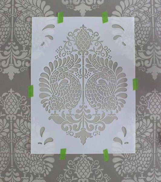 A wall stencil with a royal emblem I ZenQ Designs