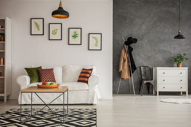 Gray and white apartment with canvas in frames - ZenQ Designs