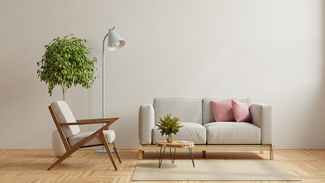 Home interior lighting with sofa and armchair on wooden floor - ZenQ Designs