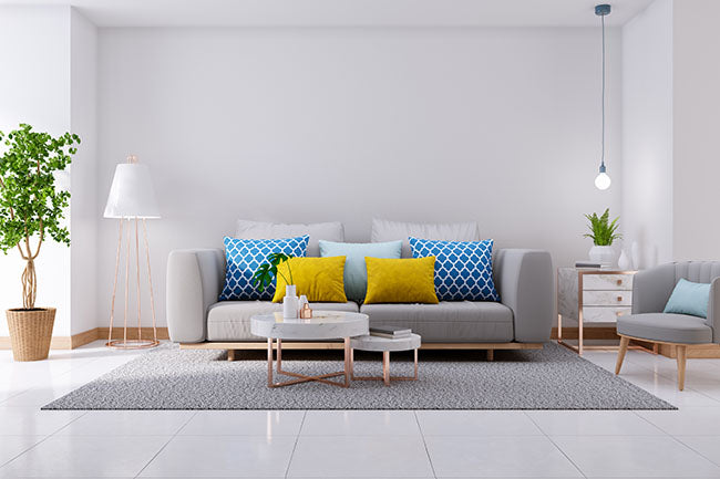 Luxurious modern interior of living room with gray sofa and floor lamp - ZenQ Designs
