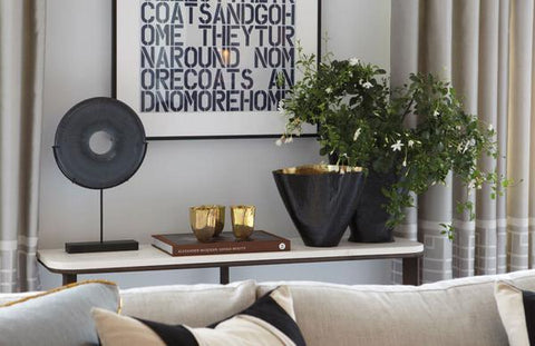 ZenQ Home Decor and Design Blog Post Disc Sculptures Photo grande f369473f d01f 49c9 8a7f - 7 DESIGNER-APPROVED LIVING ROOM DECOR IDEAS